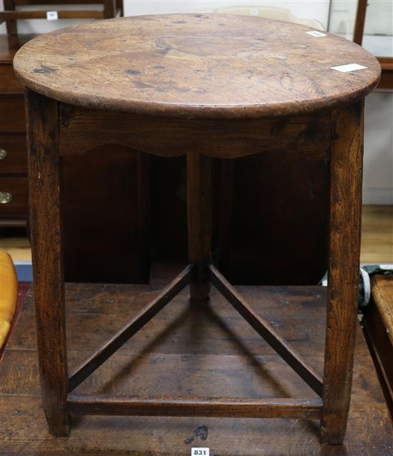 A late 18th century oak cricket table, W.54cm